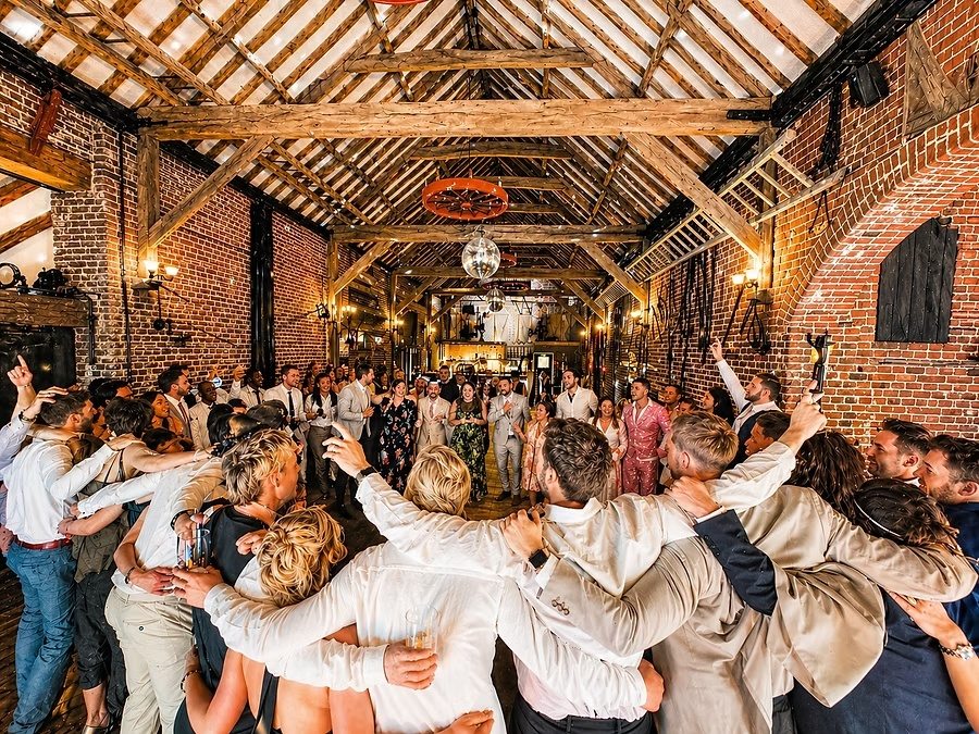 Wedding guests celebrating together at Hunters Hall